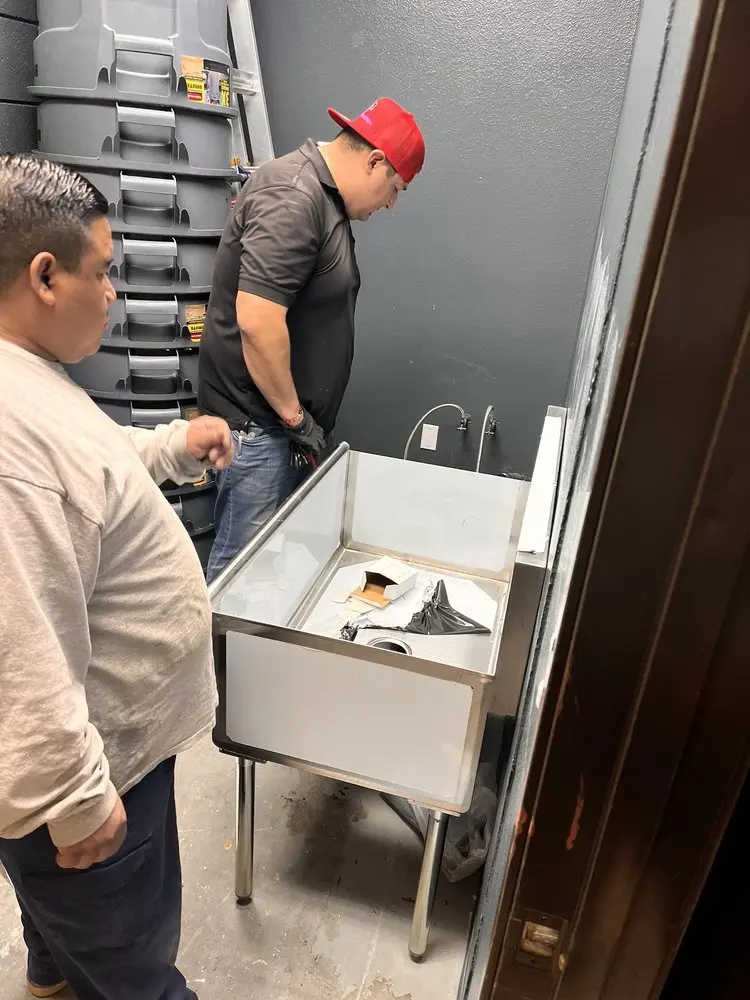 Commercial plumbing and sink installation in Heartland